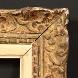 An Early 20th Century French carved frame, rebate size - 10.5" x 13.75" (17 x 35cm).