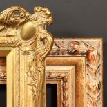 A 20th Century gilt composition frame, rebate size - 20" x 30", along with a Continental composition