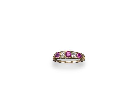 A 19th century ruby and diamond half hoop ring, alternately-set with rubies and diamonds in carved and pierced yellow gold mo