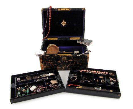 A leather jewellery box by Fischer with two removable sectioned trays and Bramah lock and containing various items of jewelle