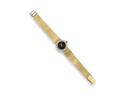 A lady's diamond and gold Kutchinsky wristwatch, the plain signed black dial within gold bezel and a border of circular-cut d