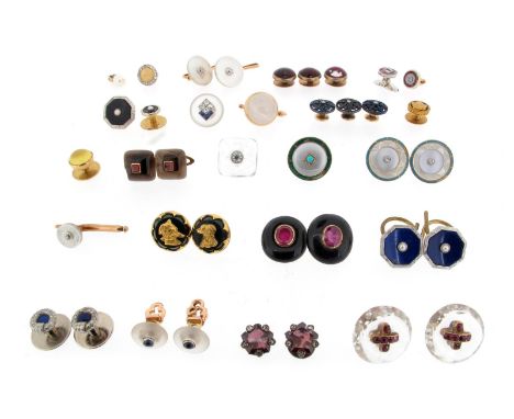 A collection of single and pairs of dress links, including a pair of French ruby-set gold studs with black enamel surrounds, 