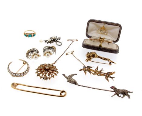 A 9ct gold doormouse brooch. An Edwardian seed pearl-set gold closed crescent brooch. A gold fox mask brooch. A gold stock pi