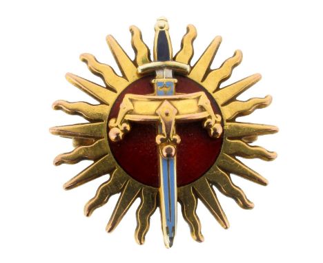 A 9ct gold military brooch, the emblem depicting a sun centred with a crown and sword with enamel decoration. 3cm wide. With 