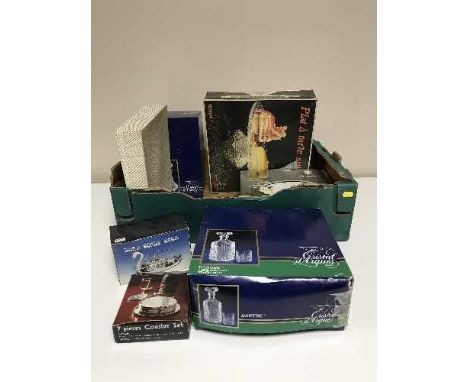 A box of boxed French crystal, decanter and tumblers, boxed comport, plated serving dish, coasters etc 
