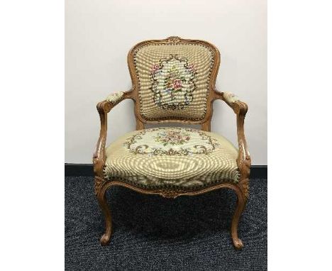 A tapestry upholstered armchair 