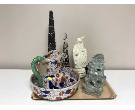 A tray of ironstone jug and basin, two marble obelisks (one restored), pair of soapstone foo dogs, Buddha figure etc 