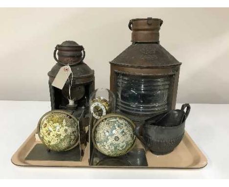A tray of copper Starboard and Stern ship's lights, clock under shade, globe bookends etc 