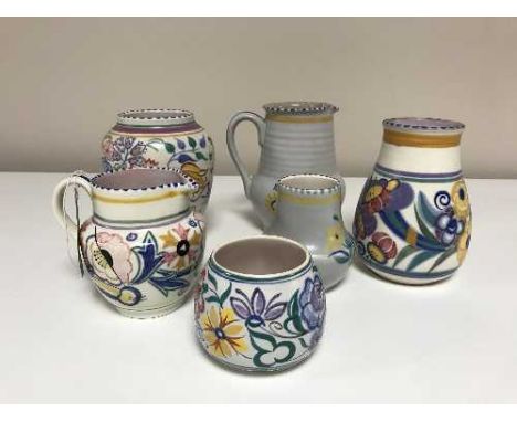 Six pieces of Poole pottery inc. four vases and two milk jugs 