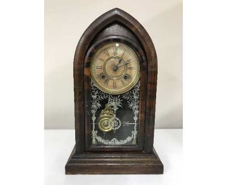 A late 19th century Tudor American mantel clock 