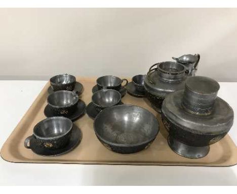 A tray of sixteen piece oriental pewter mounted tea service 