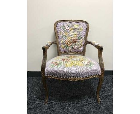 A tapestry upholstered armchair 