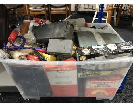 A box of power tools, hand tools, work lights, car parts, car manuals etc 