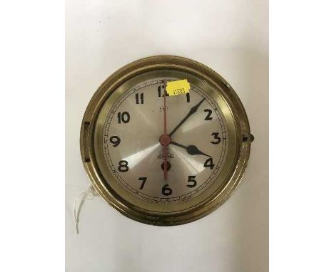 A circular brass ship's wall clock by Viking