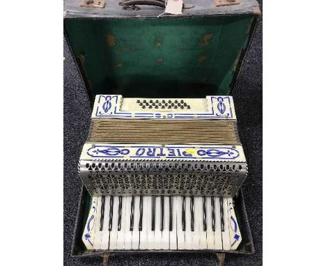 A cased Pietro piano accordion 