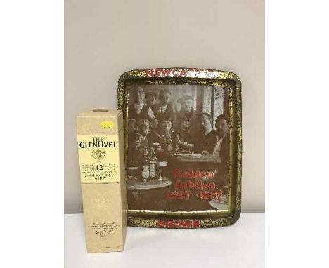 A bottle of Glenlivet Single Malt Scotch Whisky aged 12 years, 70cl, in box, together with a Newcastle Brown Ale golden jubil