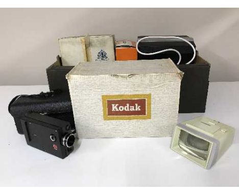 A box of Agfa camera, Kodak cine camera, photographic lamp, projector etc 