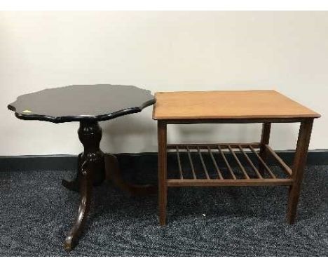 A teak lamp table and a shaped pedestal table 