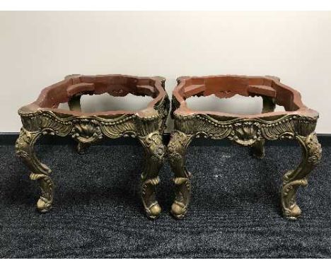 A pair of gilt lamp table bases 