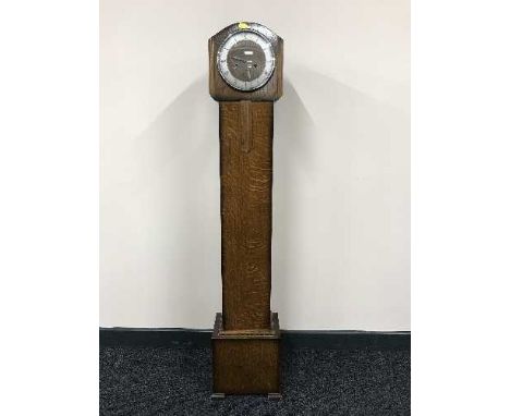 An oak Granddaughter clock 