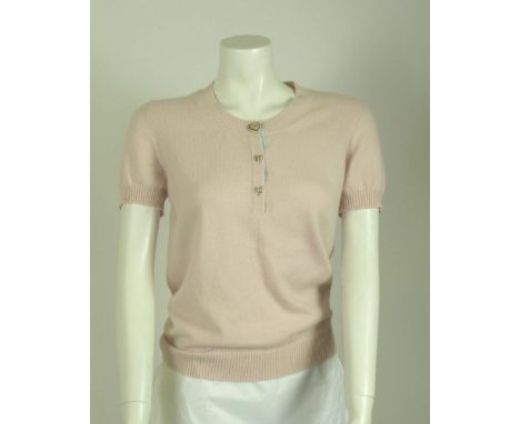 A Chanel limited edition 'Miami 2008-2009 Collection' pink cashmere jumper,with three diamanté and enamel heart buttons to th