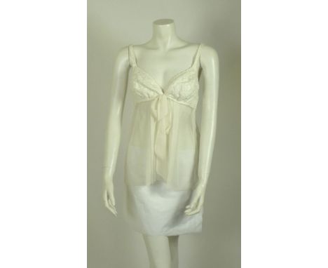 A Chanel cream baby doll top,cream silk tweed bodice and white silk chiffon section, chiffon bow and pleated front