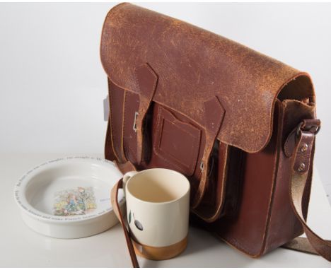 Wedgwood "Peter Rabbit" nursery ware, Poole pottery, Spode "Edwardian Childhood" and a leather satchel.