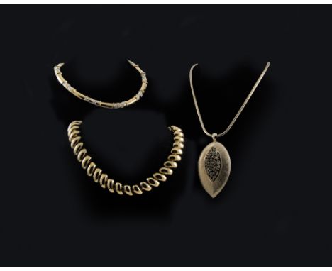 Costume Jewellery, a collection of gilt metal jewellery to include a snake link necklace with paste set leaf pendant, a Zepte