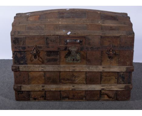Two banded and domed trunks, a mahogany box, and one other trunk.