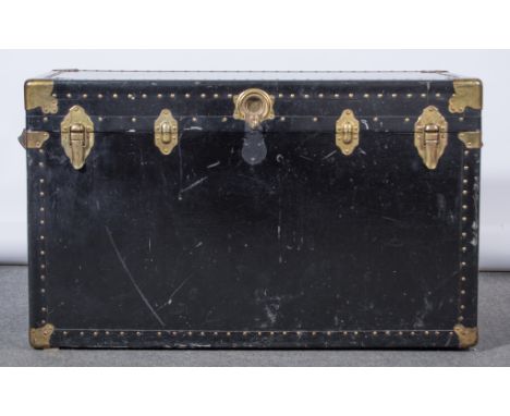 Large hard bodied travelling trunk.