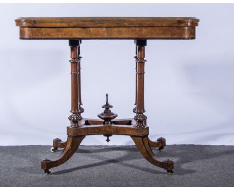A Victorian burr walnut card table, rectangular fold-over top, with rounded corners, plain frieze, turned column supports, sp