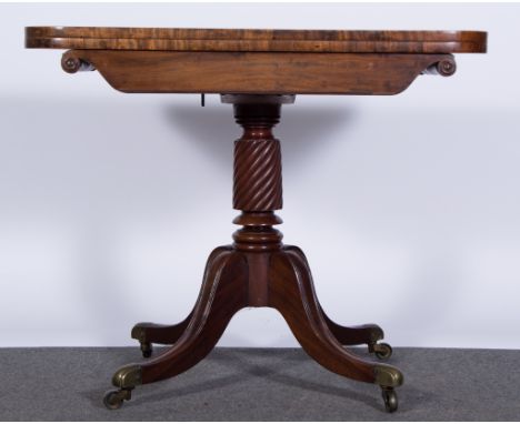 Early Victorian mahogany card table, rectangular fold-over top, rounded corners enclosing a blue baize lining, scrolled friez