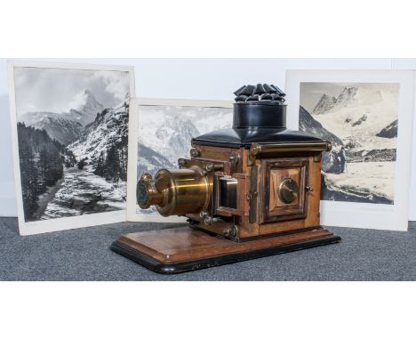 A Victorian mahogany, lacquered brass and tin lantern projector, (converted to electricity), depth of platform 59cm, and a sm