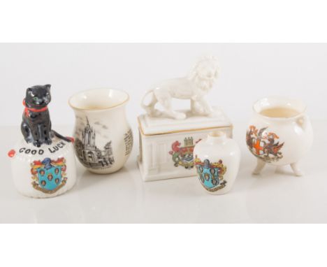 A collection of Goss and other similar ceramic souvenirs, railway wagon, black cat, etc.