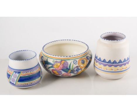 Four pieces of Poole pottery, including bowl, mustard pot and two similar pots.