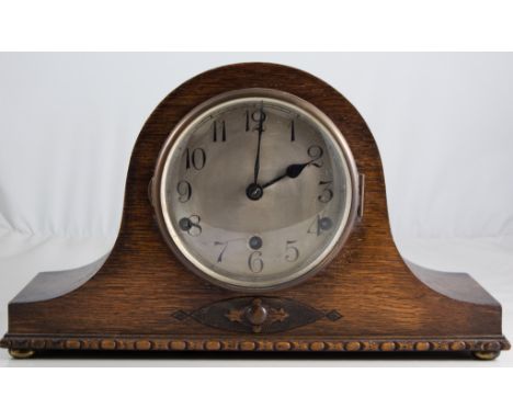 An oak Napoleon's hat mantel clock, Alba movement striking on five gongs, 40cm