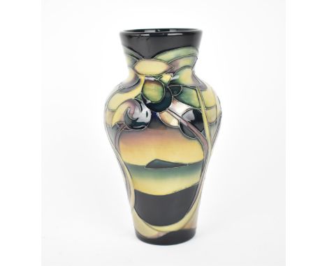 A Moorcroft pottery "Western Isles" baluster vase designed by Sian Leeper, 2006, with tubeline decoration of a seascape throu