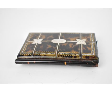 A Victorian tortoiseshell, mother of pearl and white metal pique wallet, the inside with blue silk fan compartment, with an A
