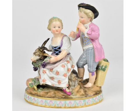 A 19th century Meissen figural group modelled as the allegory of Autumn, the boy playing the pipe, the girl seated holding a 