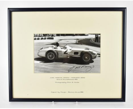 A signed reprinted photograph of Juan Manuel Fangio, racing a Mercedes Benz, Grand Prix de Monaco 1955, photographed by Alan 