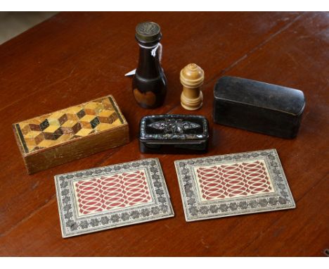 A small Tonbridgeware oblong box, the top inlaid with cube parquetry, 3 7/8in. (9.75cm.) long; together with two black papier