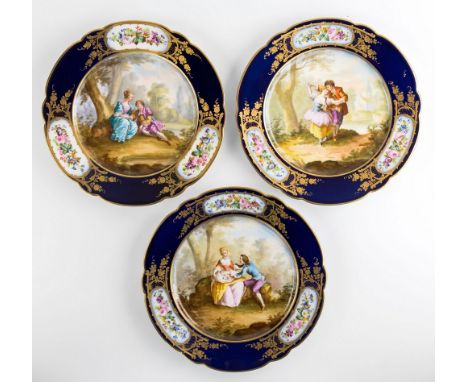 A set of three Sevres fired cabinet plates, late 19th / early 20th century, each outside decorated with a central Watteau-esq