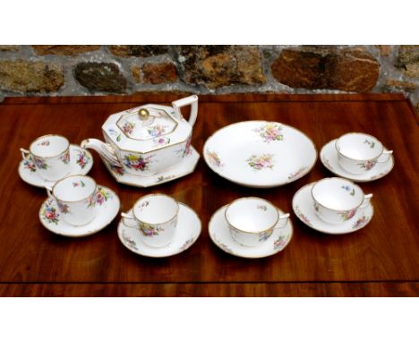 An early 19th century Spode part tea service, c.1830, pattern no. to base, '5257', each with a spray of different hand painte