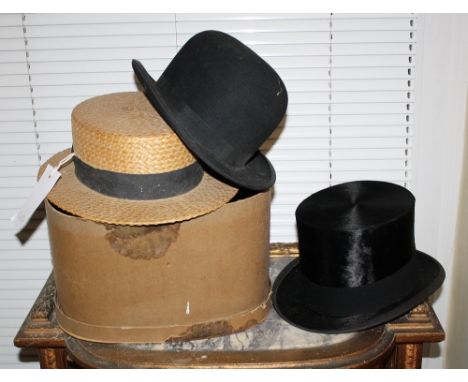 A fine quality French top hat by Gretelle of Paris, together with a straw boater and a bowler hat. (3)