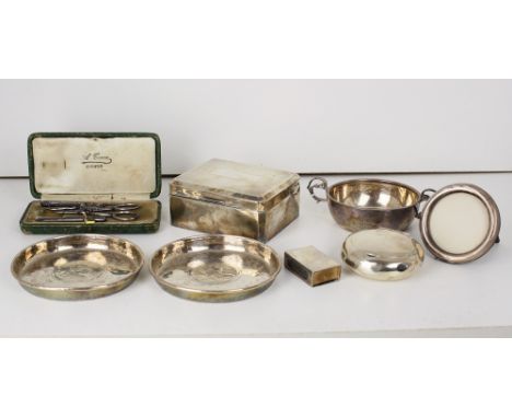 A Jersey style silver christening cup, together with a cushion shaped silver snuff box; two silver coin-set pin trays; a smal