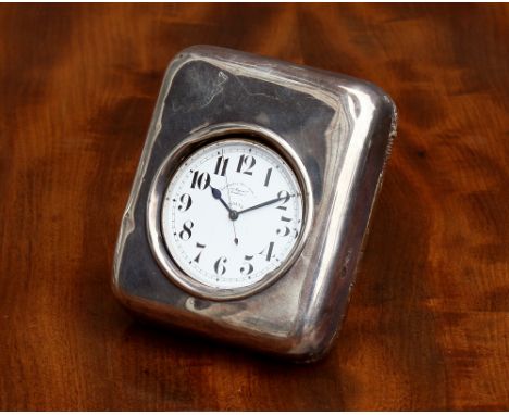 A Goliath pocket watch in silver mounted stand, the watch with plated case stamped '170809', the 60mm. enamel dial with Arabi