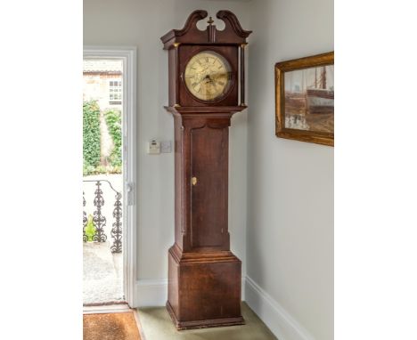 An 18th century oak 30 hour longcase clock by Jno. Ramsbottom, c.1770, the 13in. circular Roman brass dial with foliate engra
