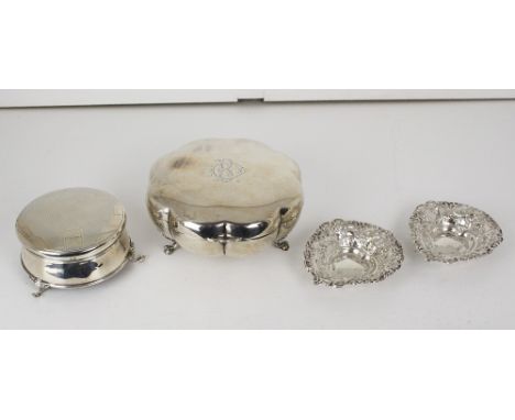 Two silver trinket boxes, one by E. S. Barnsley & Co., Birmingham 1912, of eight lobed form, raised on three lion paw feet; t