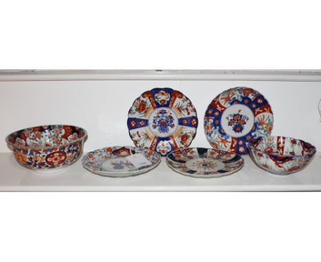 Four Japanese Imari decorated plates, late 19th / early 20th century, 8½in. to 8¾in. (21.5cm. to 22.25cm.) diameter, together