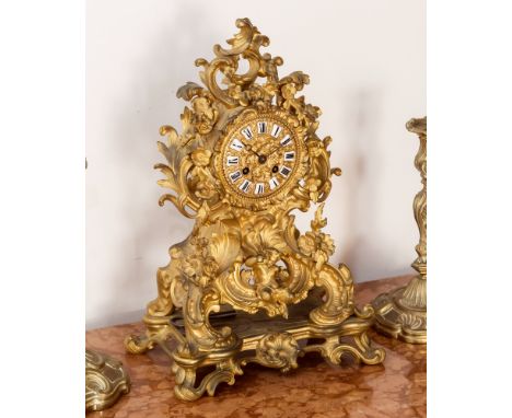 A French ormolu baroque style mantel clock, late 19th century, the movement with outside countwheel strike, movement signed '